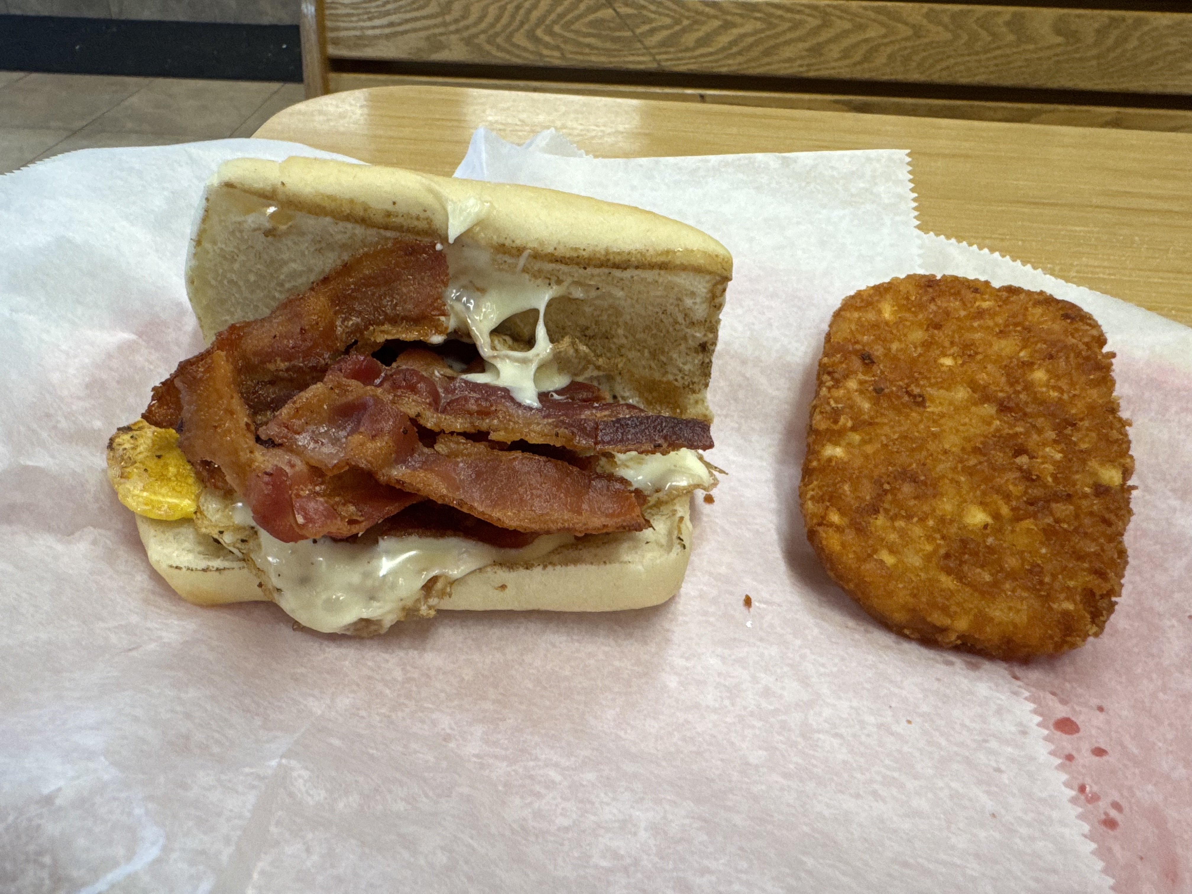 Bacon, egg, and cheese on a roll